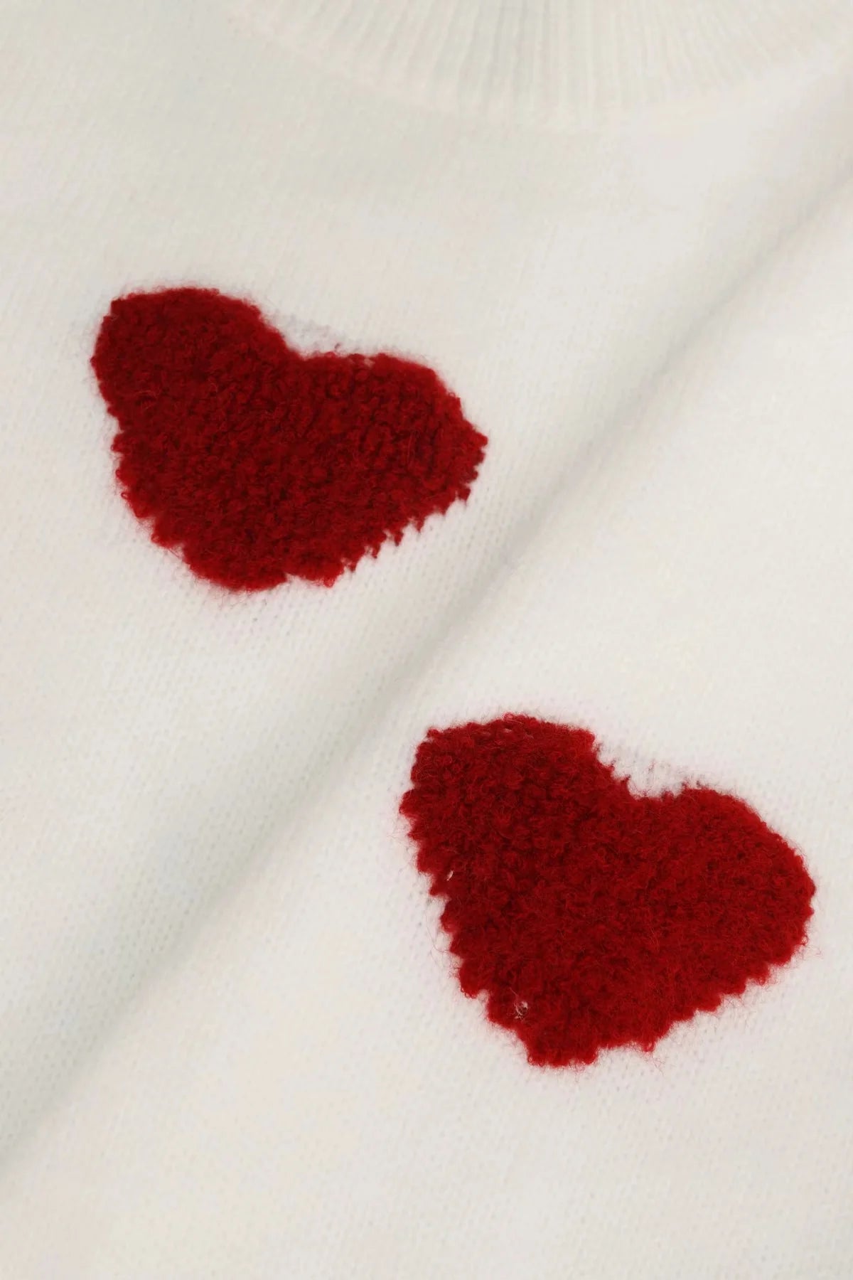 Maglione oversize con cuori